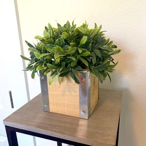 Faux plant with planter
